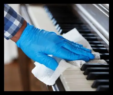 clean piano keys before you store a piano in storage